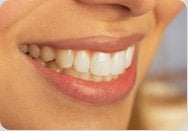 A smiling patient showing off her new smile