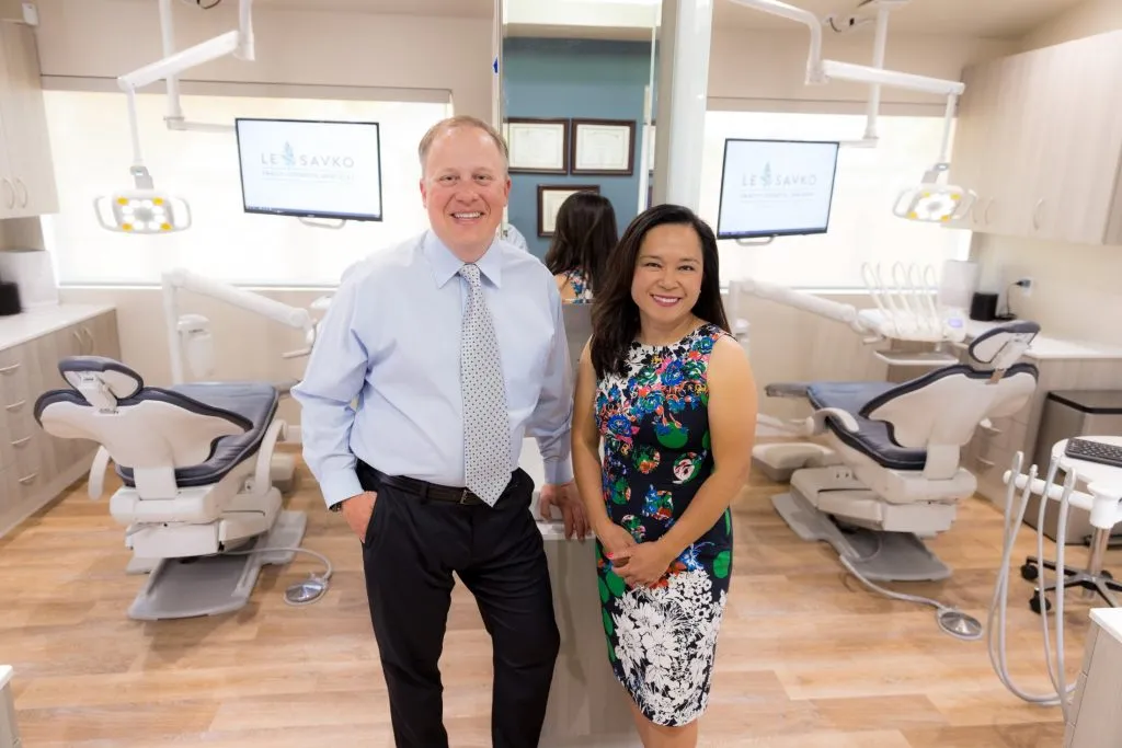 Man and woman in dentist's office.