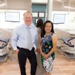 Man and woman in dentist's office.